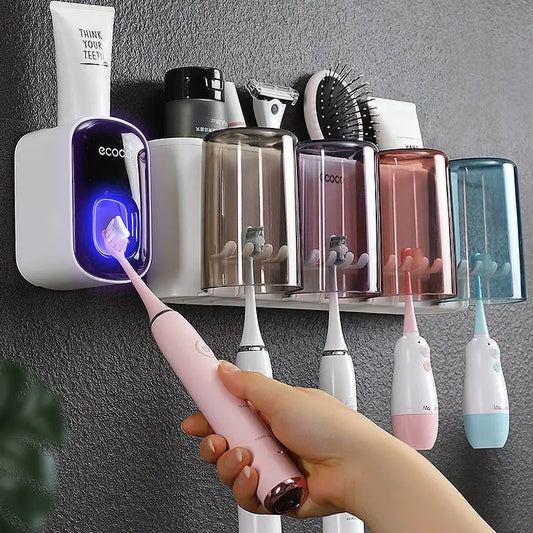 Organisateur de support de brosse à dents de salle de bain avec presse-dentifrice à tasse.