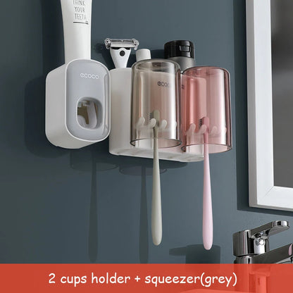 Organisateur de support de brosse à dents de salle de bain avec presse-dentifrice à tasse.