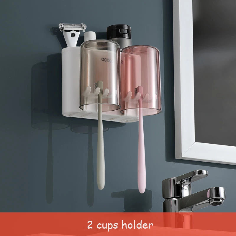Organisateur de support de brosse à dents de salle de bain avec presse-dentifrice à tasse.