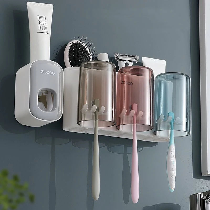 Organisateur de support de brosse à dents de salle de bain avec presse-dentifrice à tasse.
