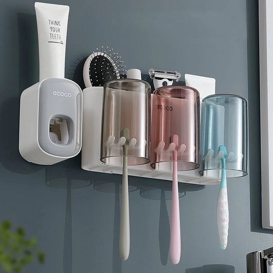 Organisateur de support de brosse à dents de salle de bain avec presse-dentifrice à tasse.